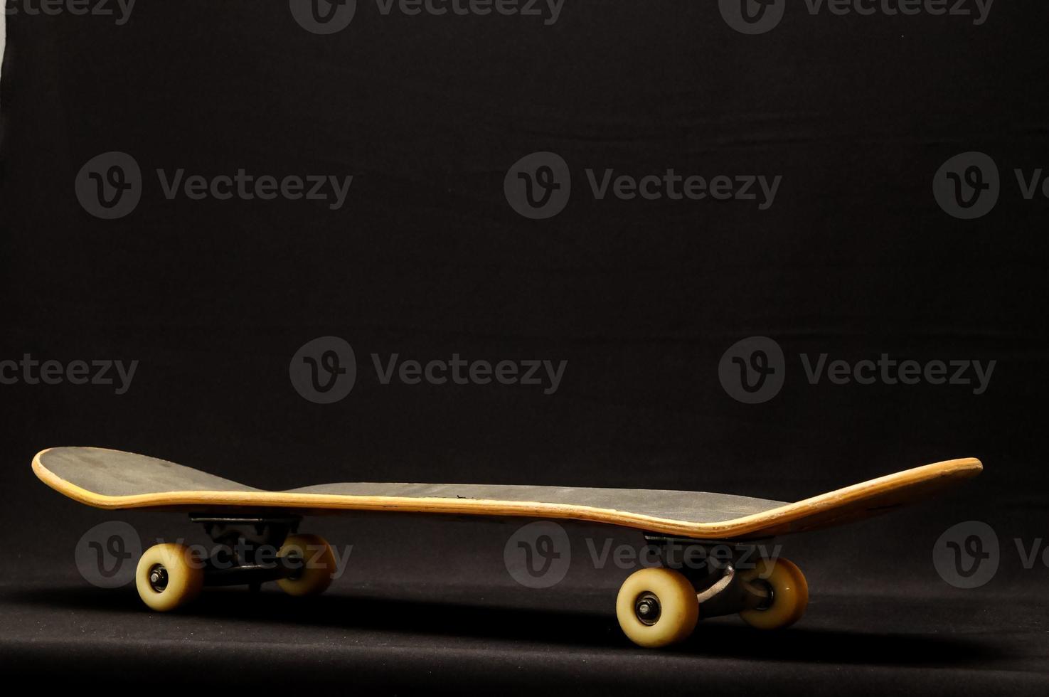 Old Used Wooden Skateboard photo