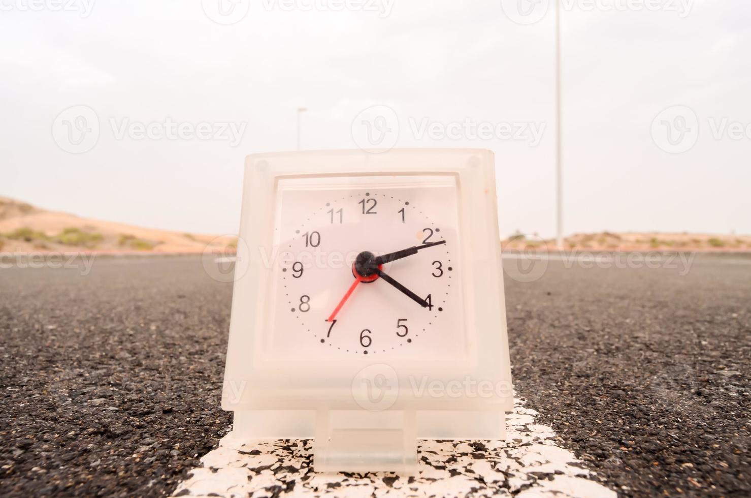 Clock on the ground photo