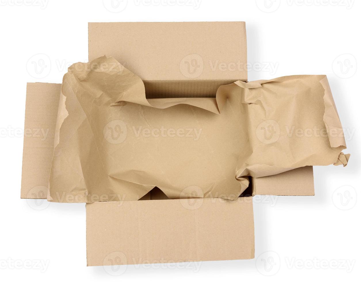 open empty rectangular brown cardboard box for transportation and packaging of goods photo