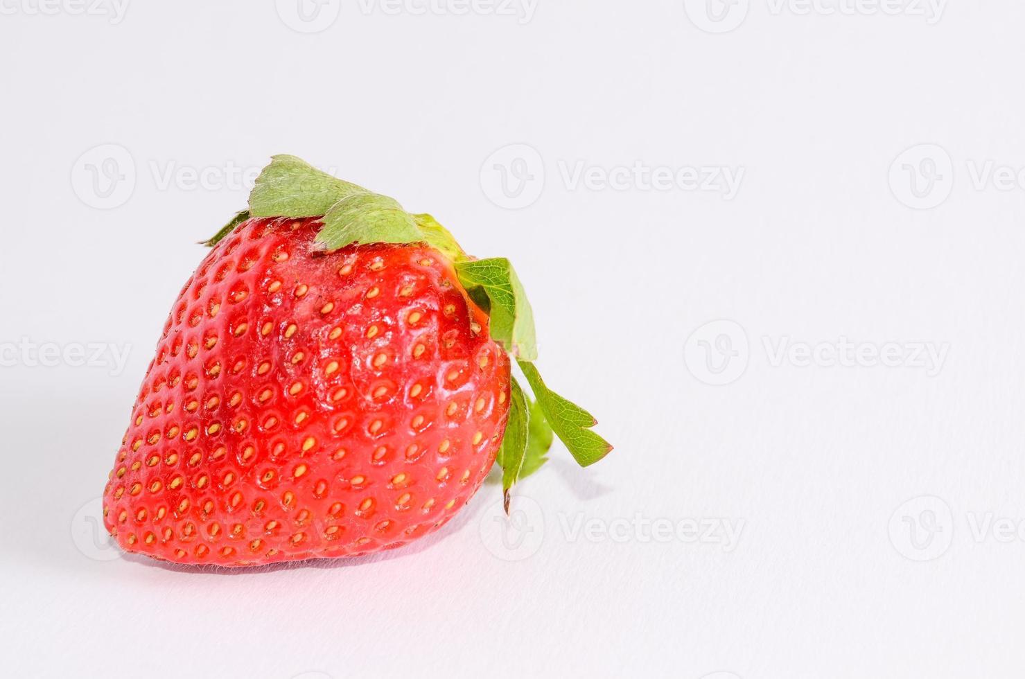 Isolated strawberry fruit photo