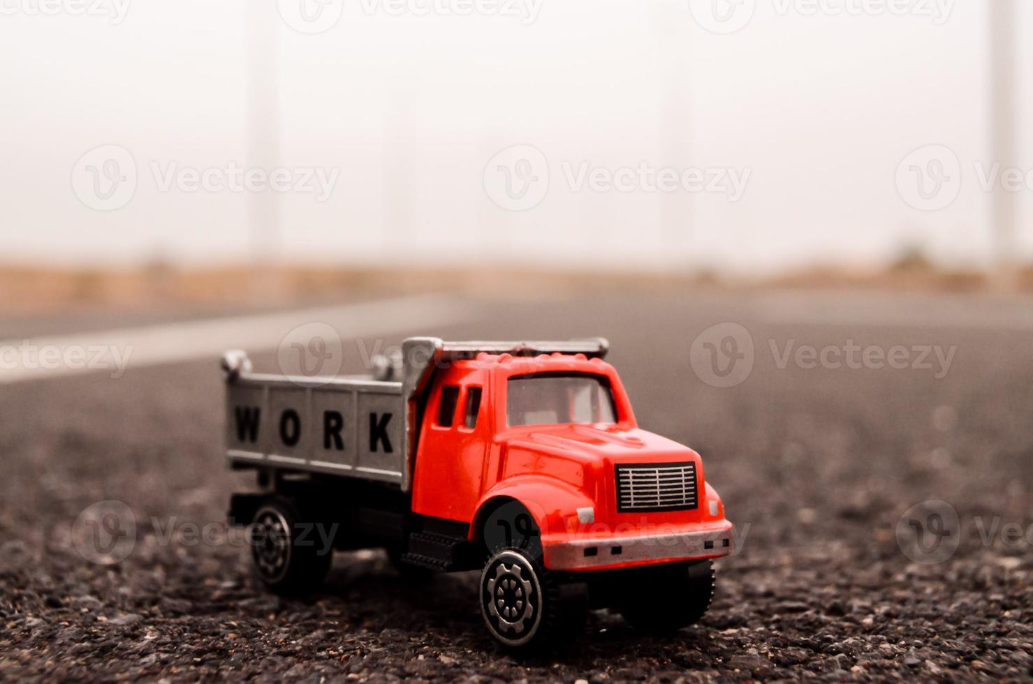 Toy truck on the road photo