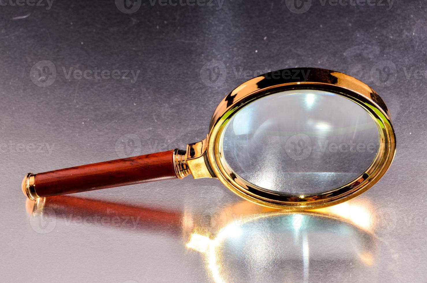 Isolated magnifying glass photo