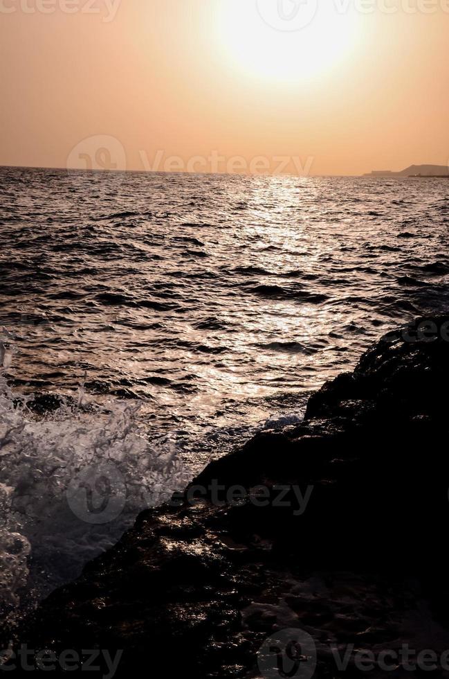 Ocean view over the sunset photo