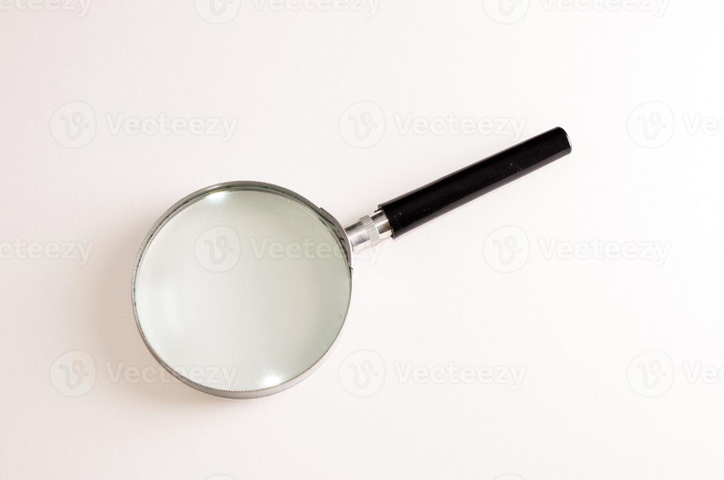 Isolated magnifying glass photo
