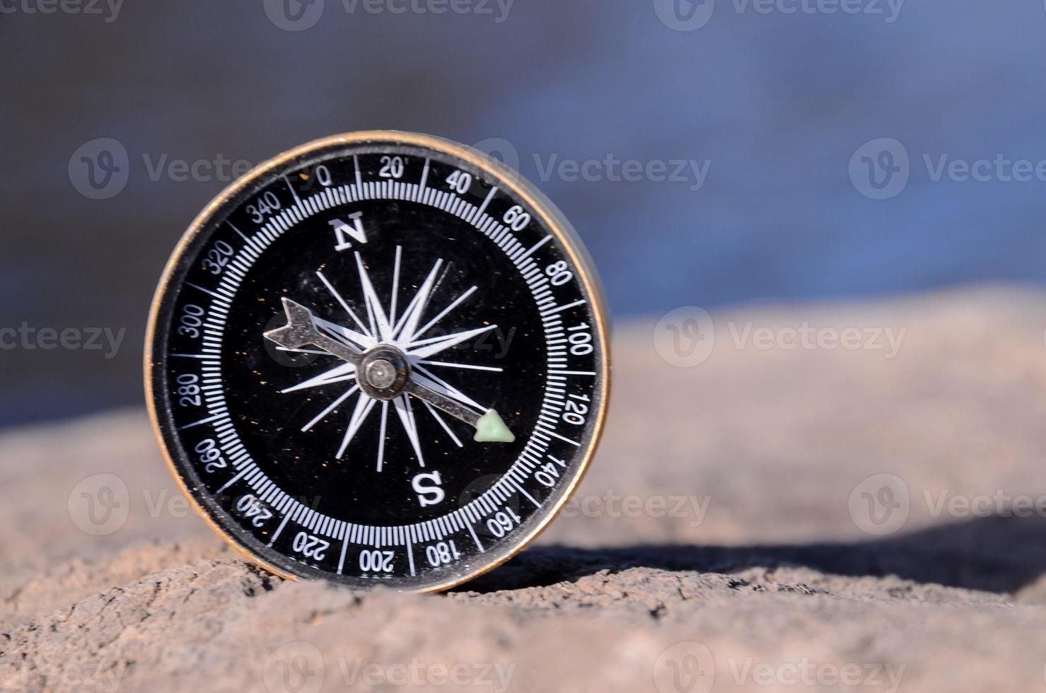 Compass on the rocks photo