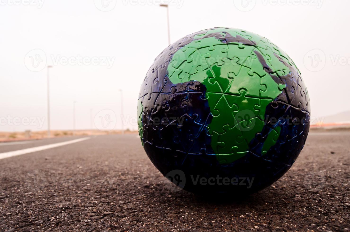 Globe on the road photo