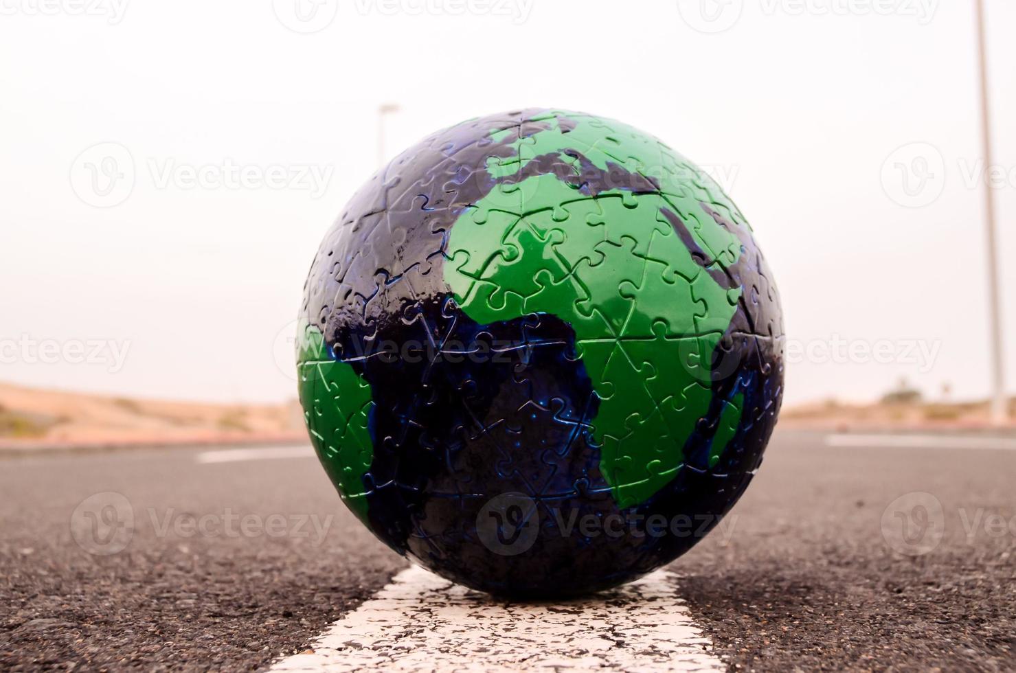 Globe on the road photo