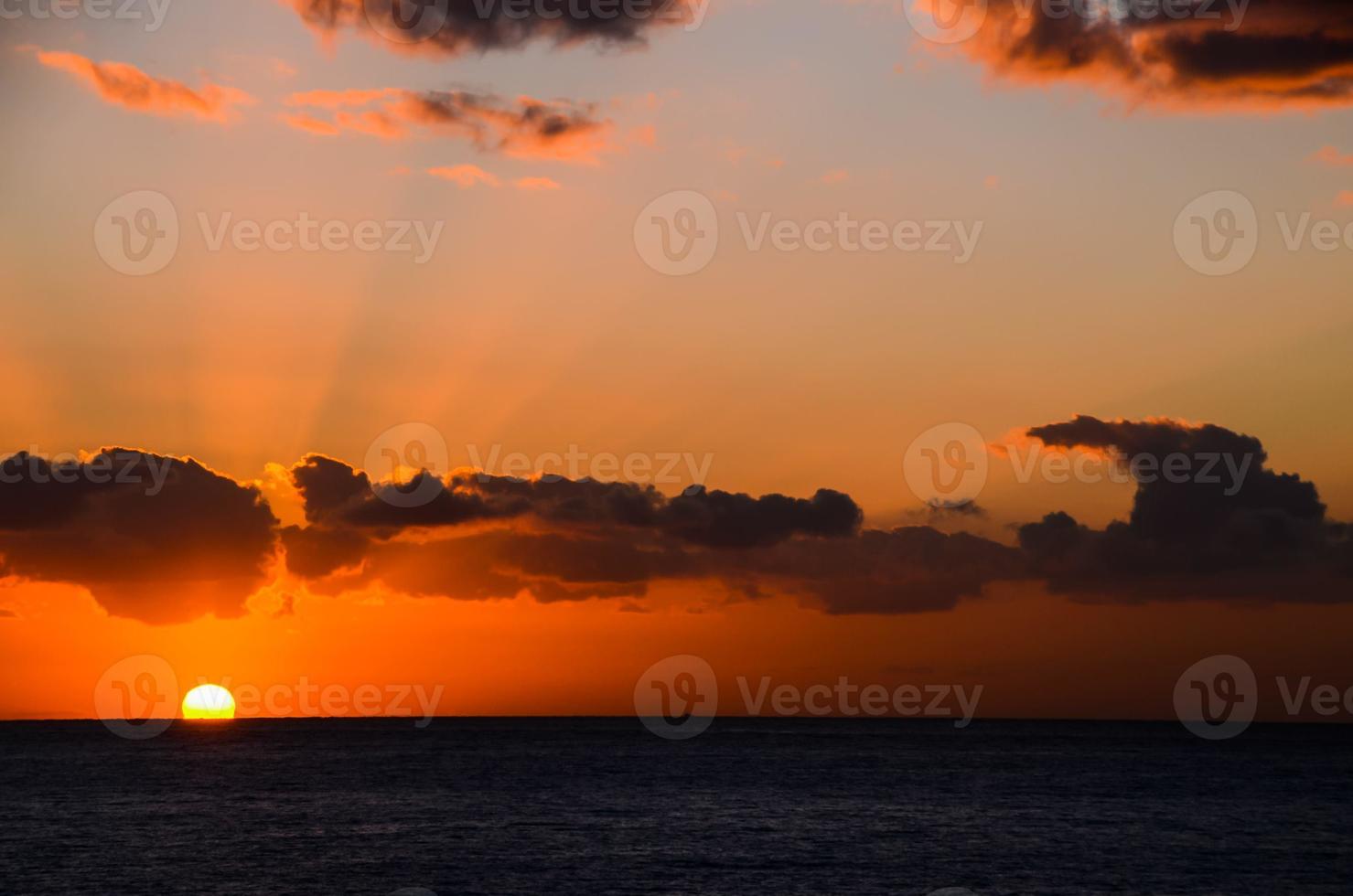 Ocean over the sunset photo
