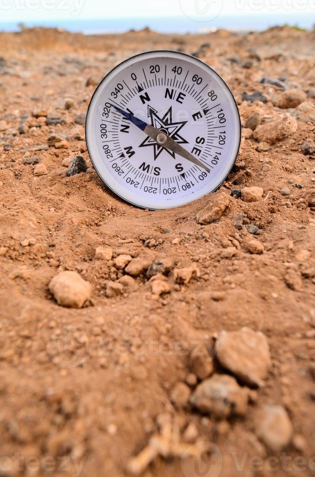 Compass on the ground photo