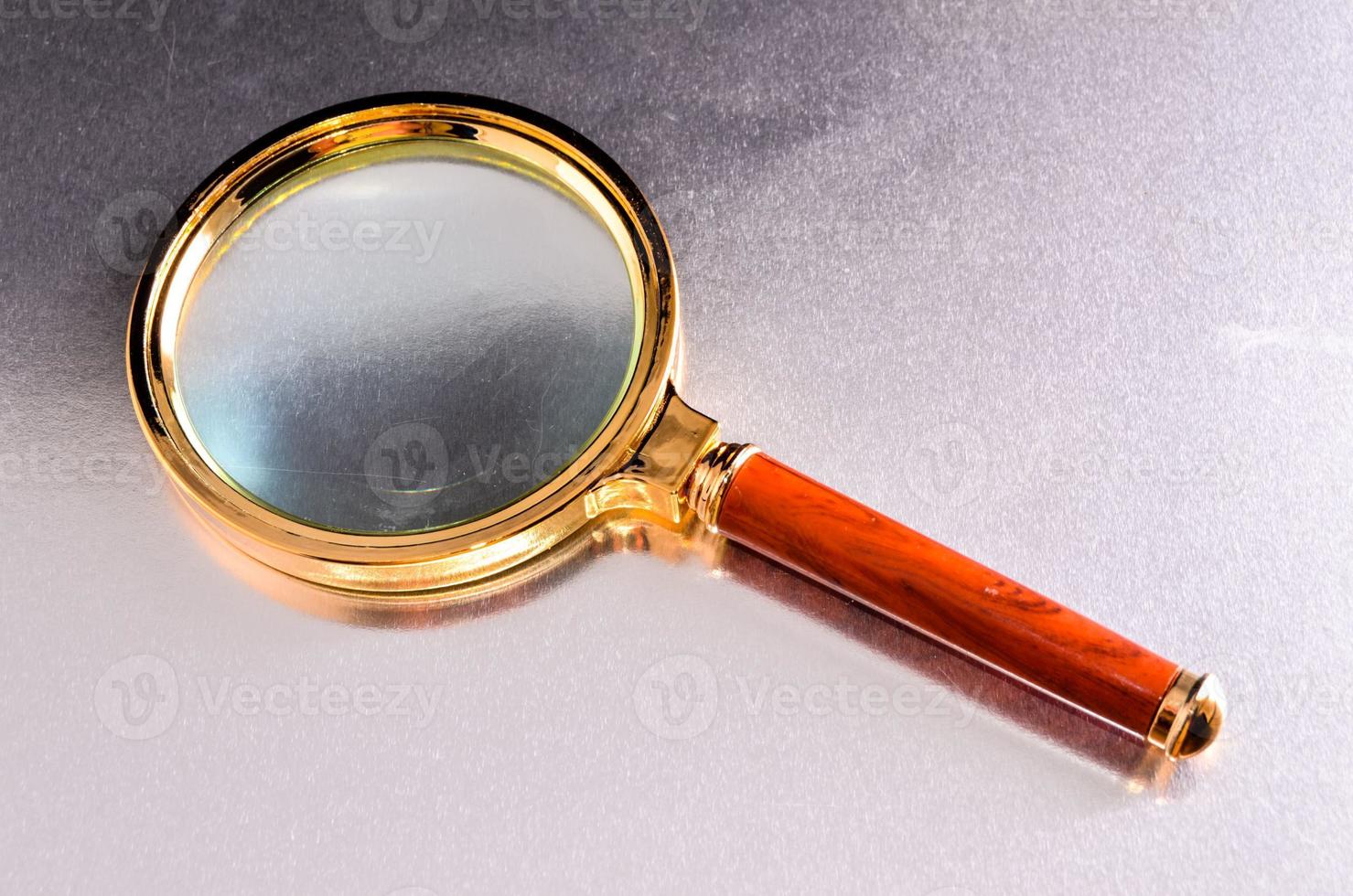 Isolated magnifying glass photo