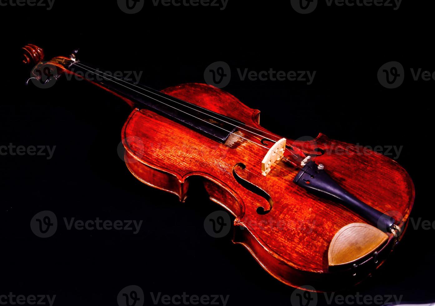 Violin on black background photo