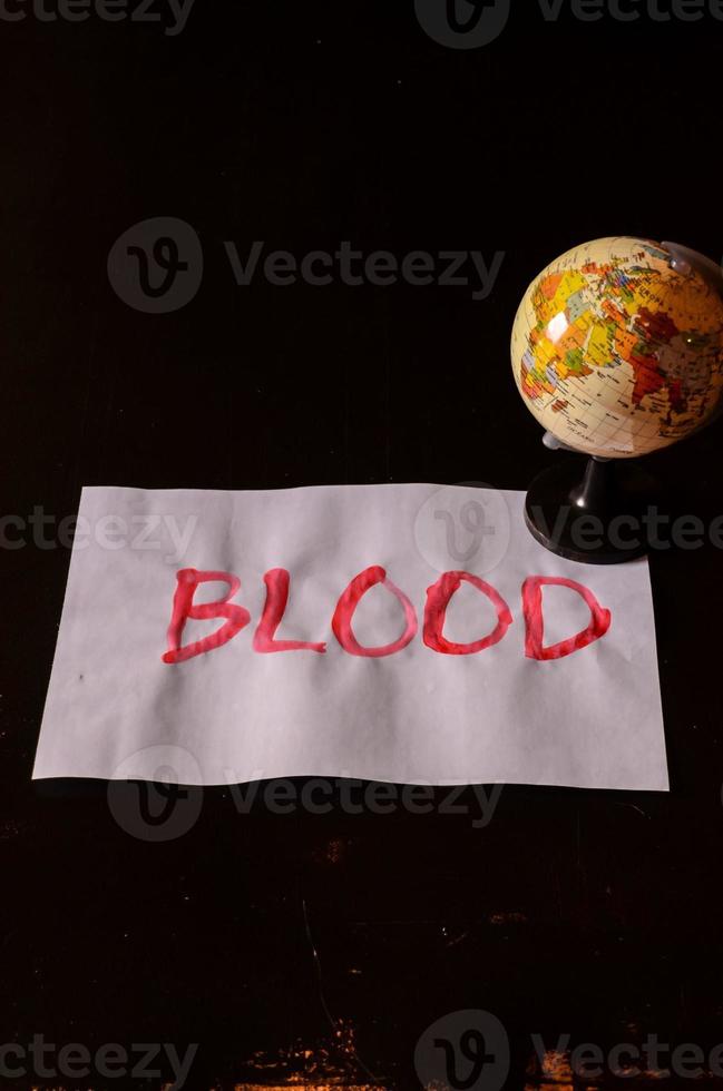 Blodd written on paper photo