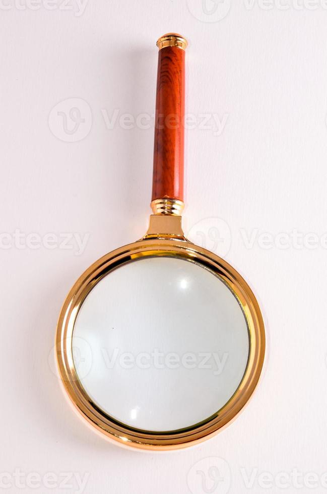 Isolated magnifying glass photo