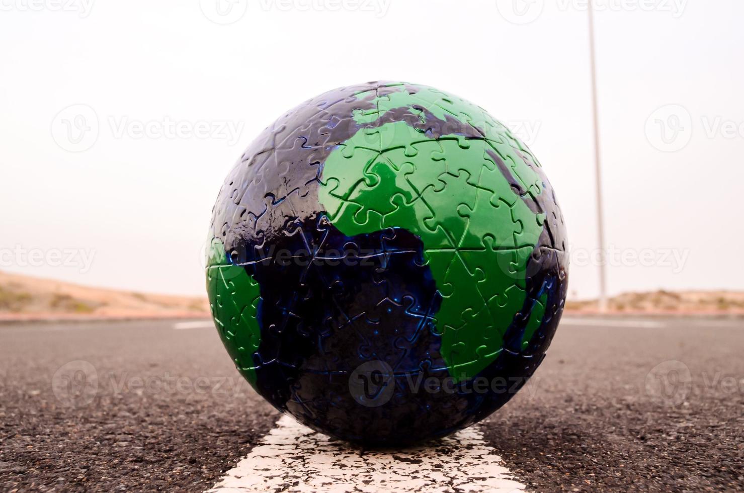 Globe on the road photo