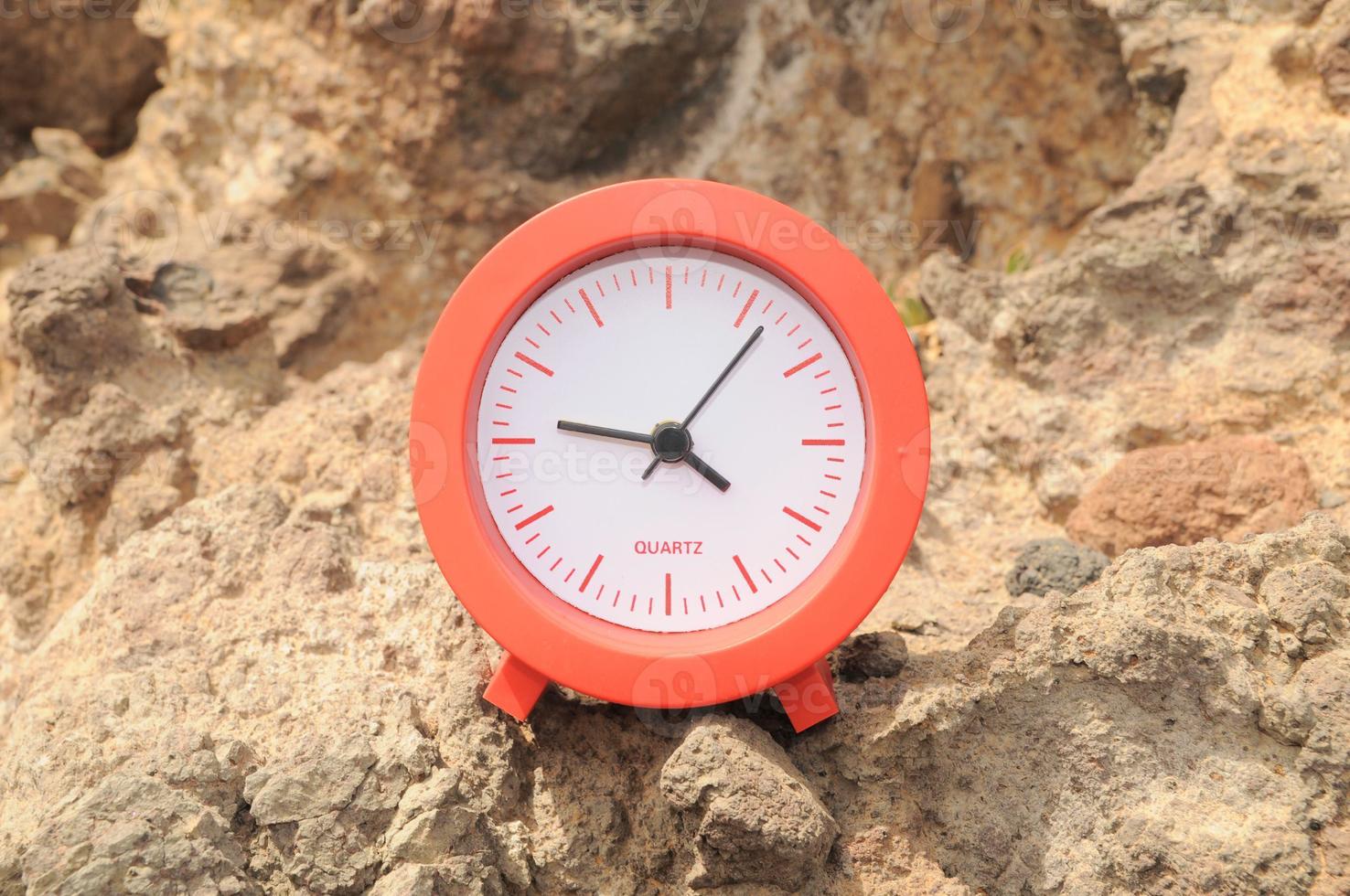 Clock on the ground photo