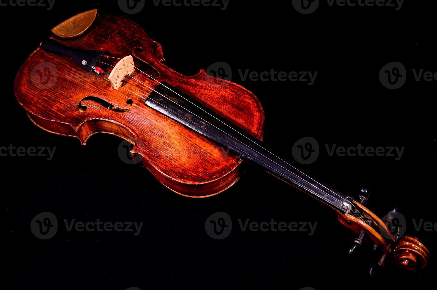 Violin on black background photo