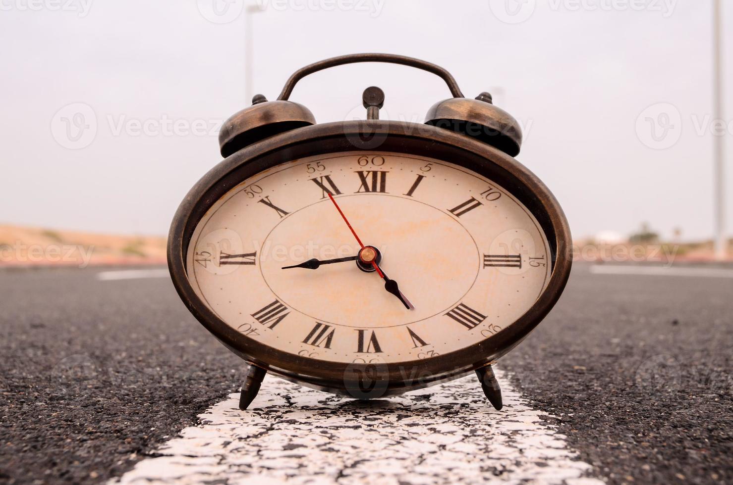 Clock on the ground photo