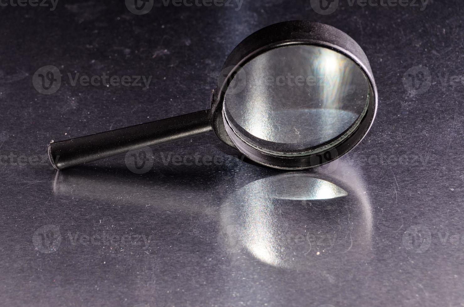 Isolated magnifying glass photo