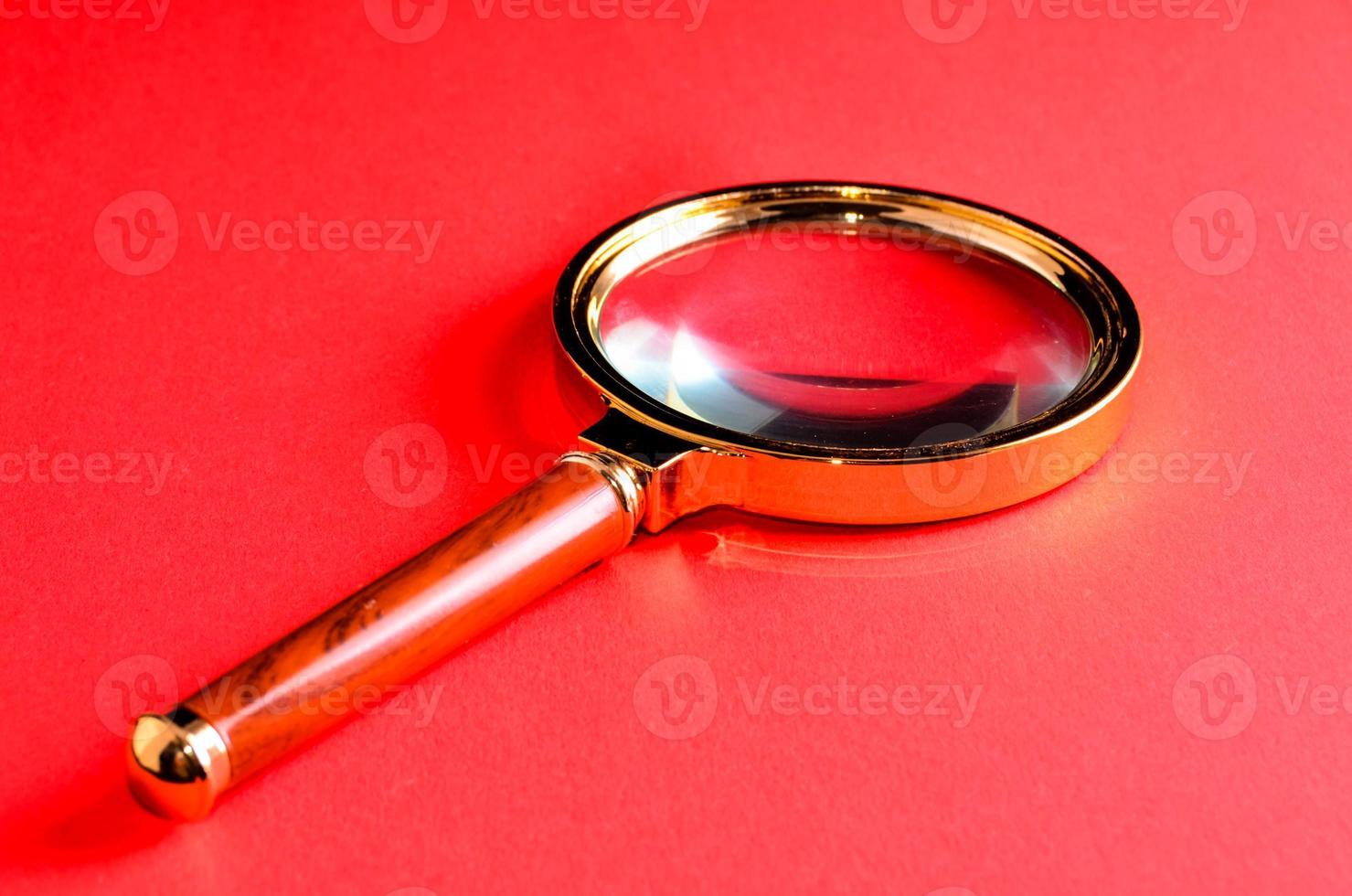 Isolated magnifying glass photo