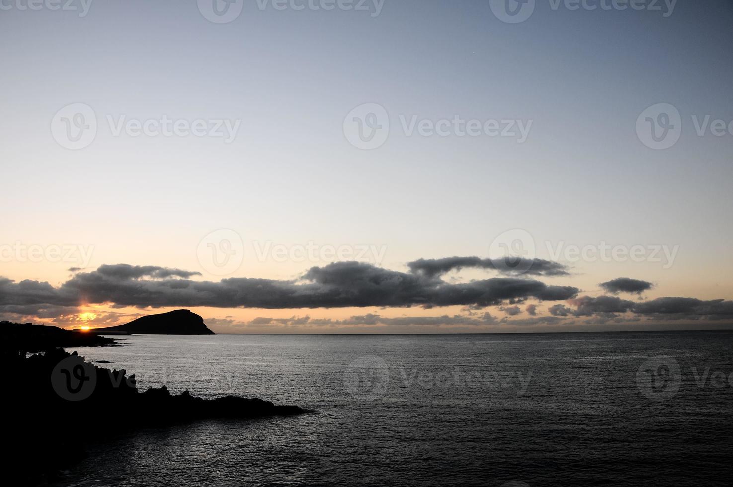 Ocean over the sunset photo