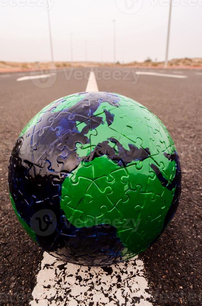 Globe on the ground photo