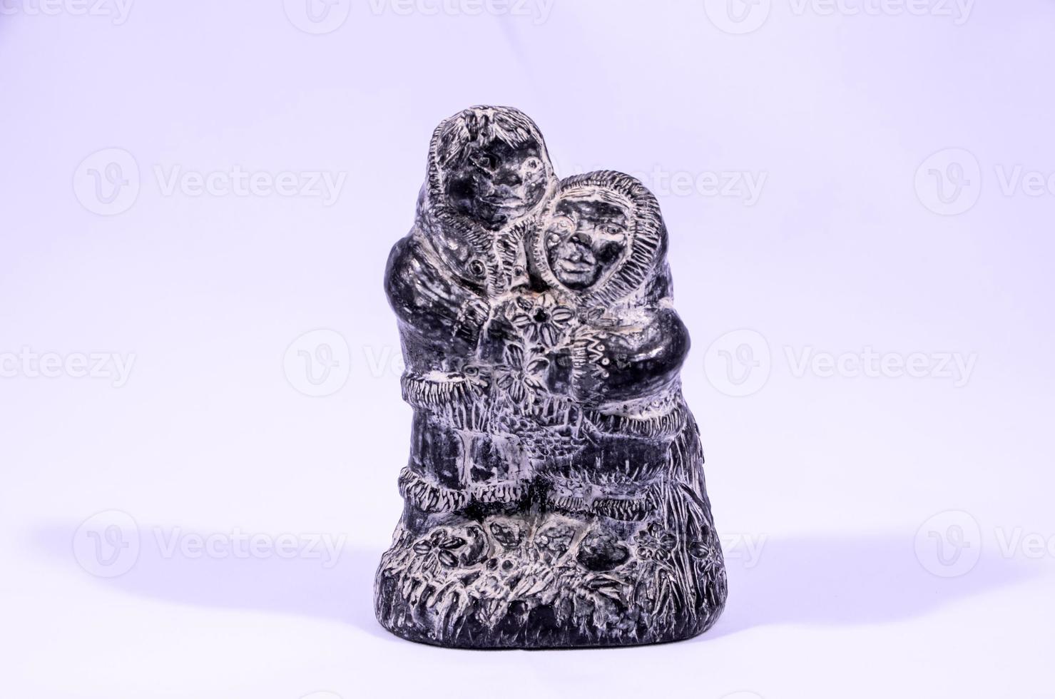 Pre-Columbian miniature on white background photo