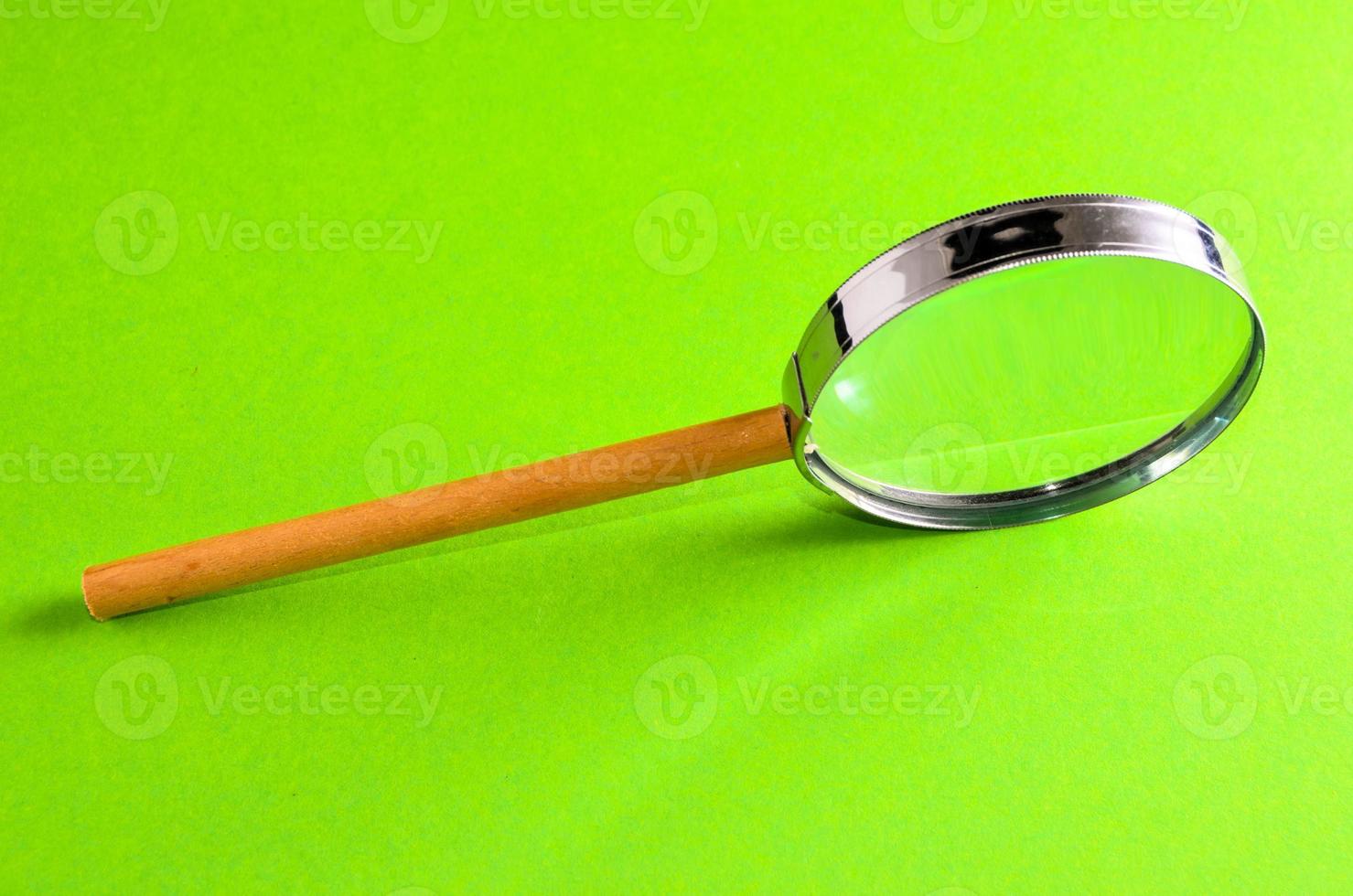 Isolated magnifying glass photo