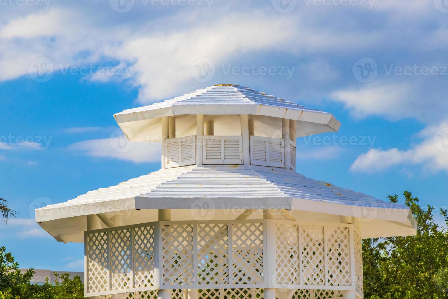 White noble pergula pavilion in paradise on beach palms Mexico. photo