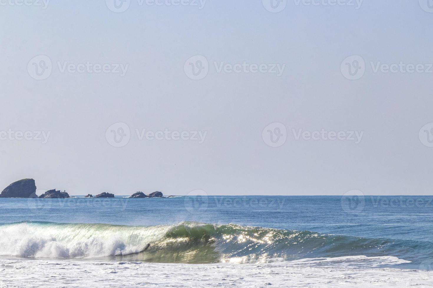 Extremely huge big surfer waves beach La Punta Zicatela Mexico. photo