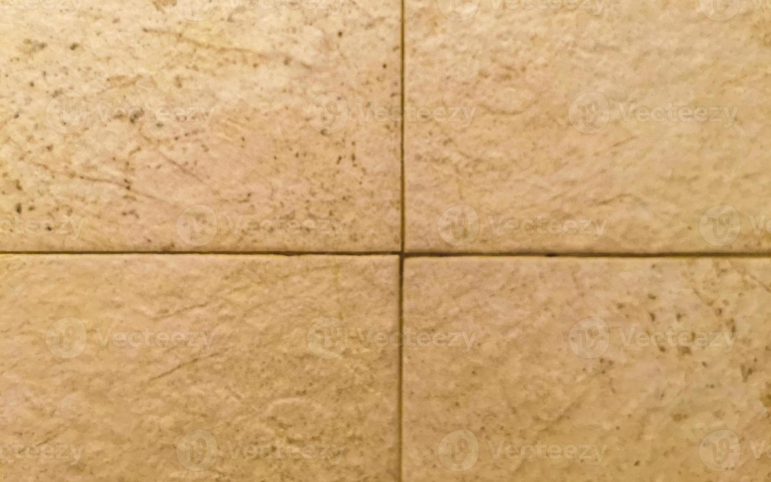 Orange and cream wall tile texture in Playa del Carmen Mexico. photo