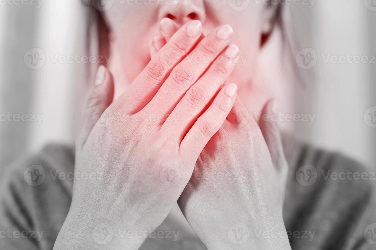 Asian woman checking her breath with hand test. Health Care concept. photo