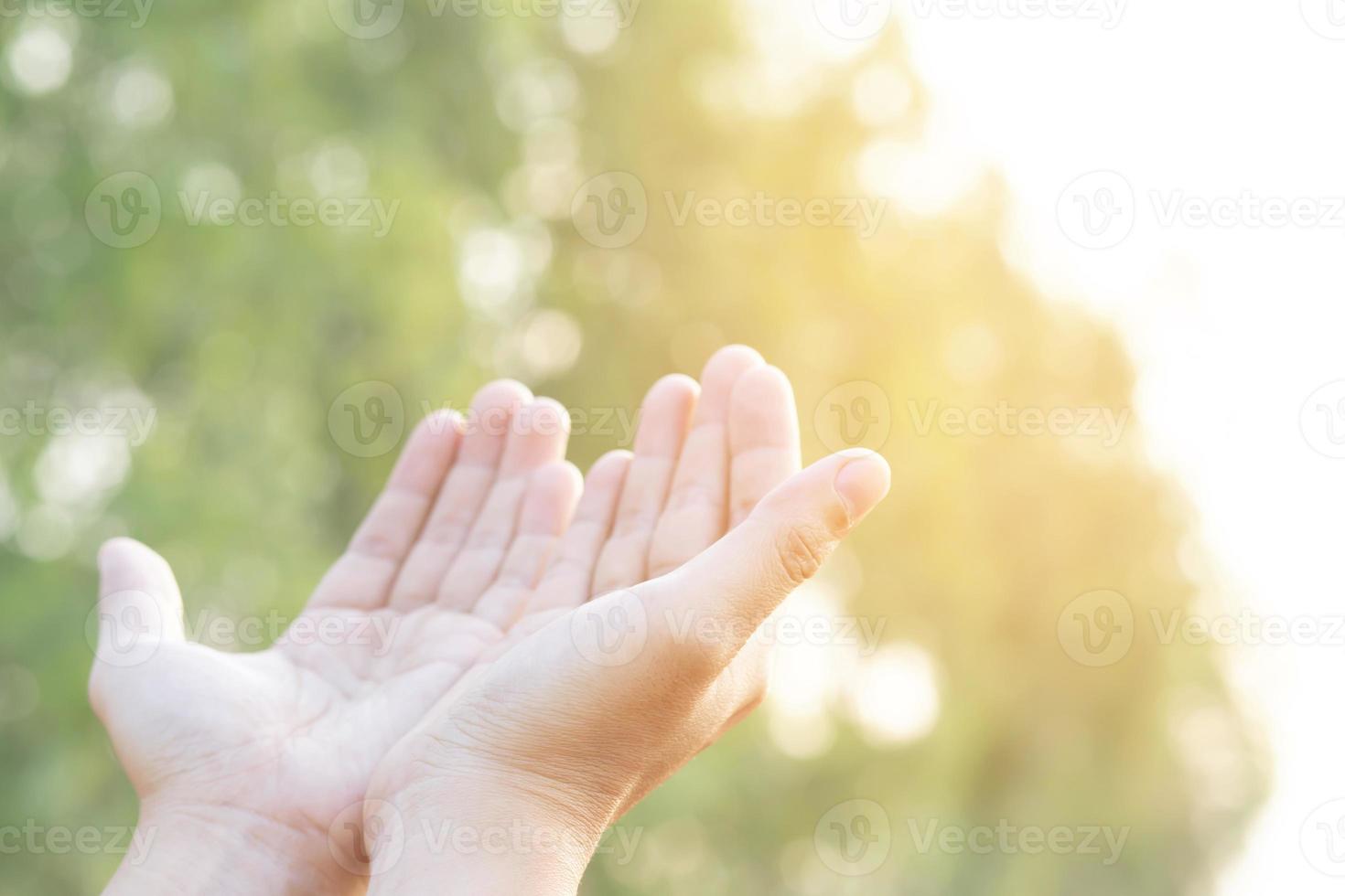 Human hands open palm up worship Praying hands with faith and belief in God of an appeal to the sky. Concept Religion and spirituality with believe Power of hope or love and devotion photo