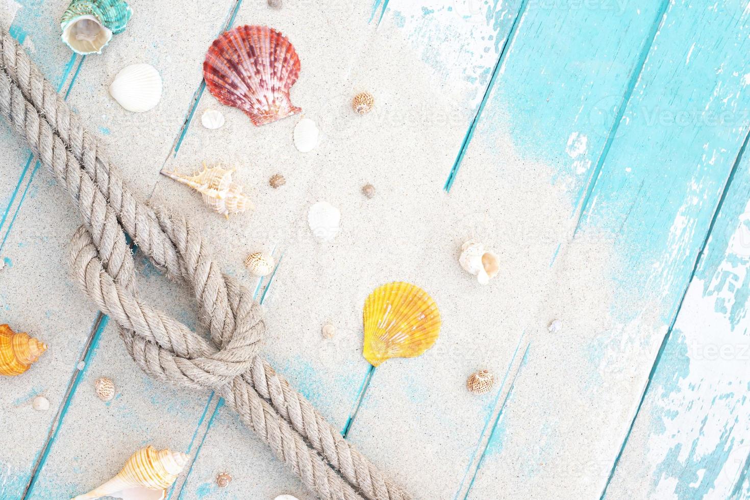pattern rope on a blue old wooden background. Top view. Leave a copy space for writing descriptive text. photo
