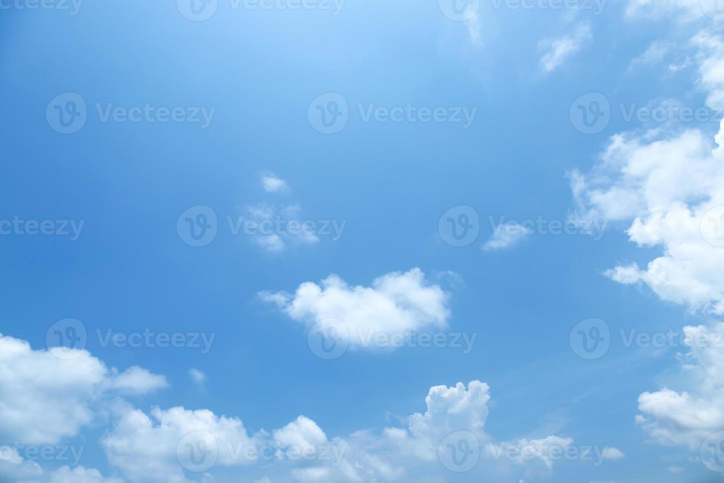 Beautiful clear blue sky background with tiny plain white cloud on