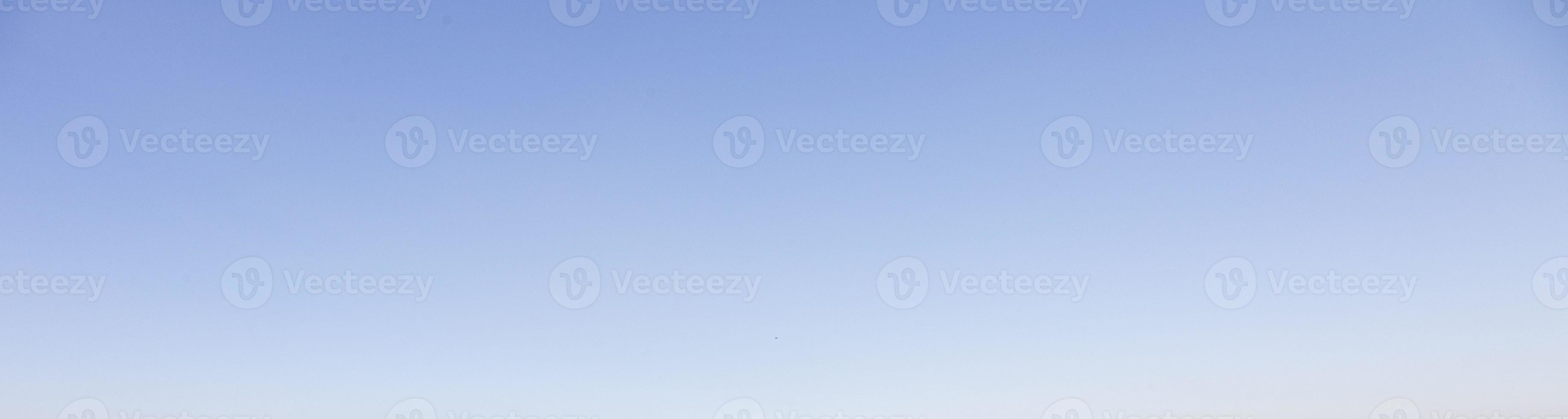 Image of a partly cloudy and partly clear sky during the day photo