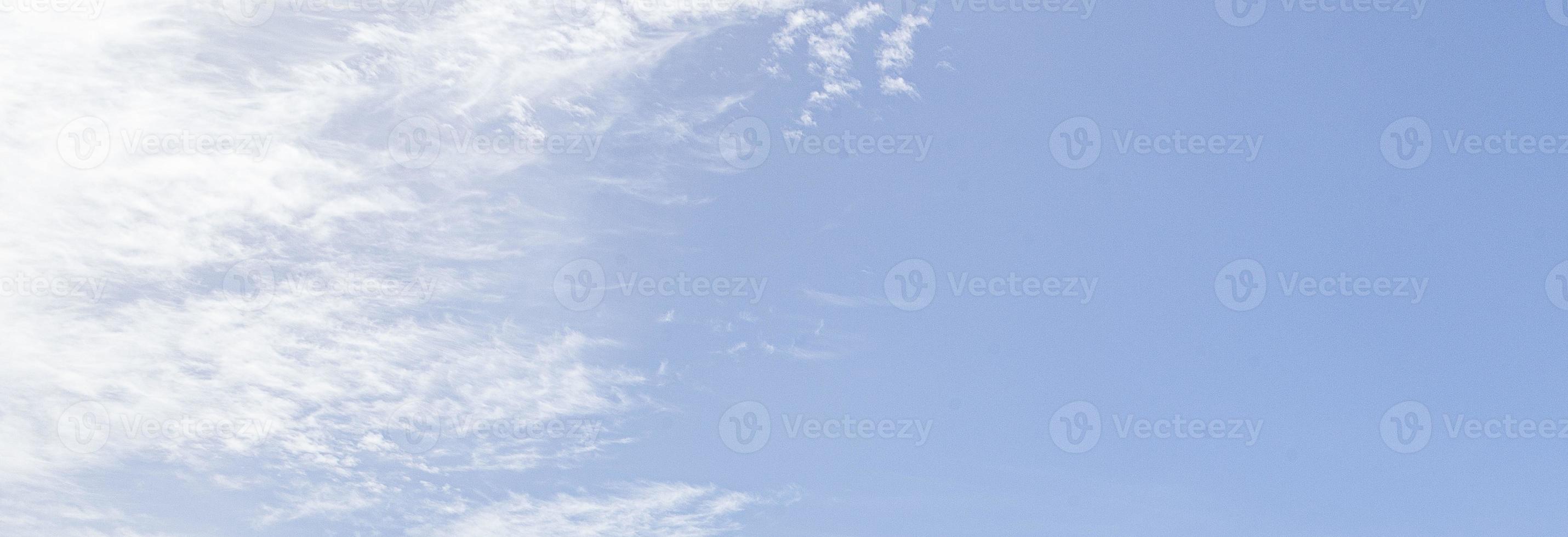 Image of a partly cloudy and partly clear sky during the day photo