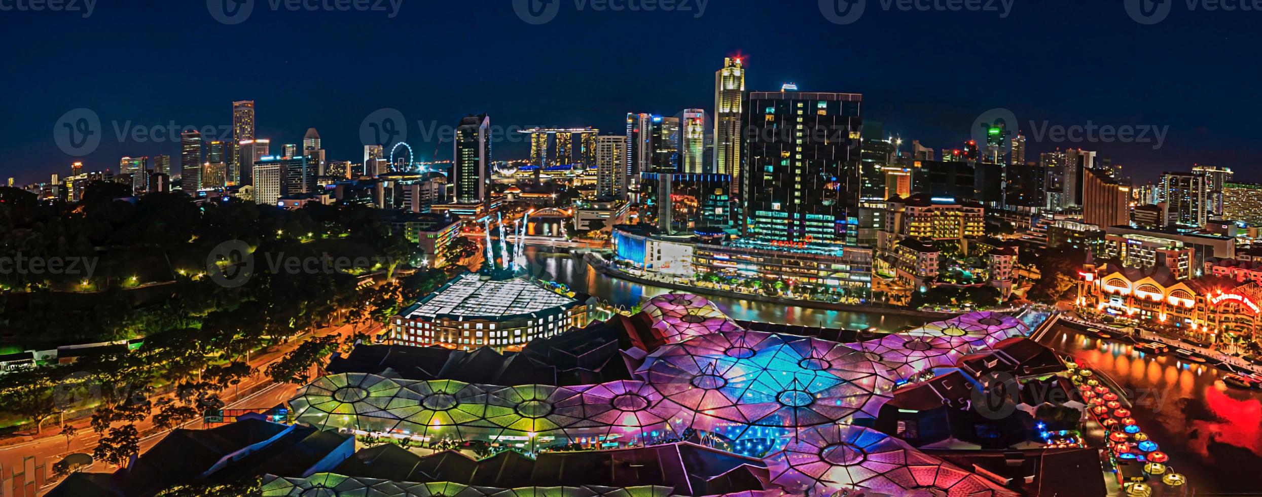 Panoramic view of Singapore skyline at night photo