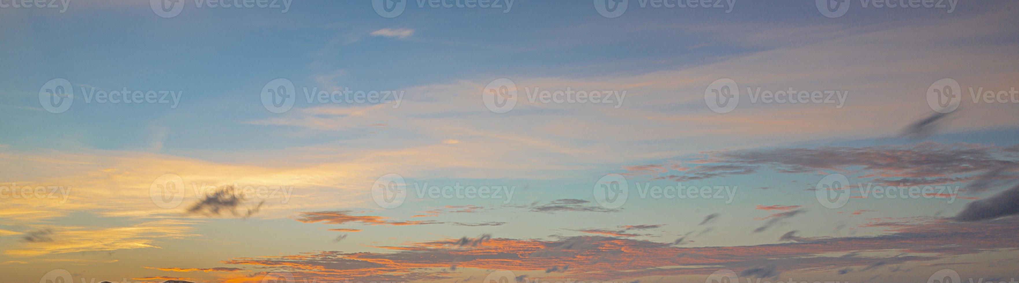 Dramatic colorful sky with afterglow and illuminated clouds photo