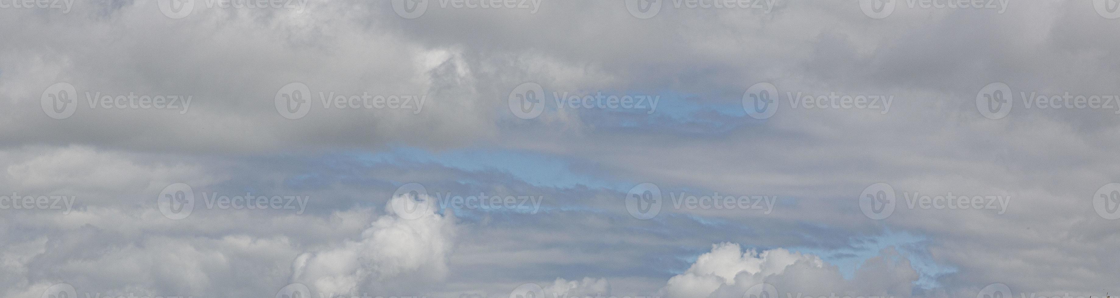 Image of a partly cloudy and partly clear sky during the day photo