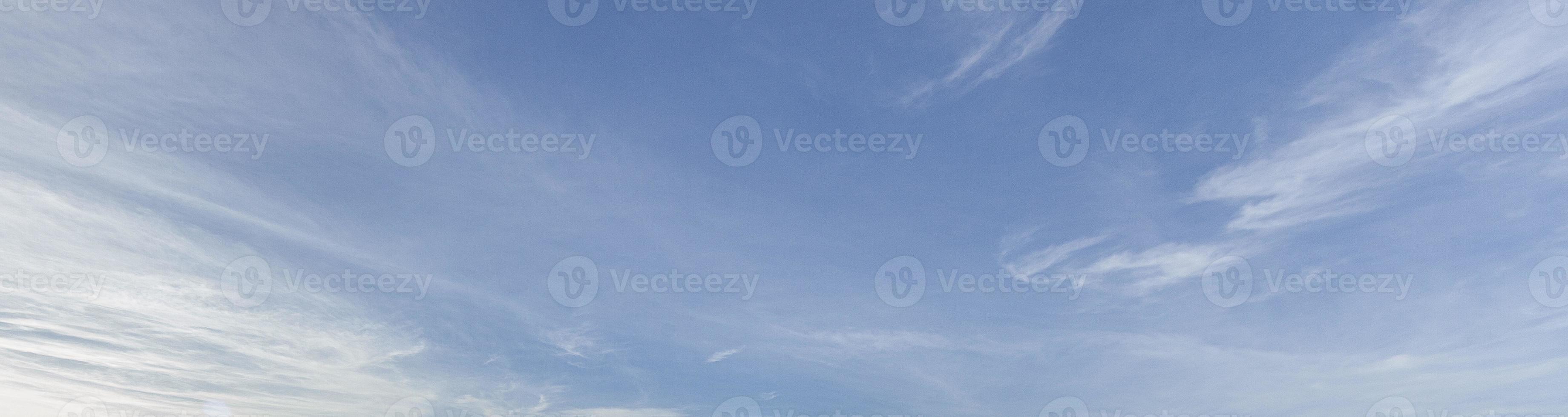 Image of a partly cloudy and partly clear sky during the day photo