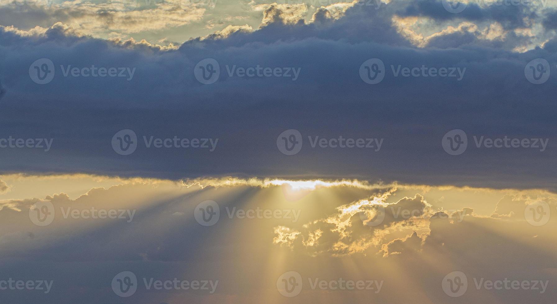 Dramatic colorful sky with afterglow and illuminated clouds photo