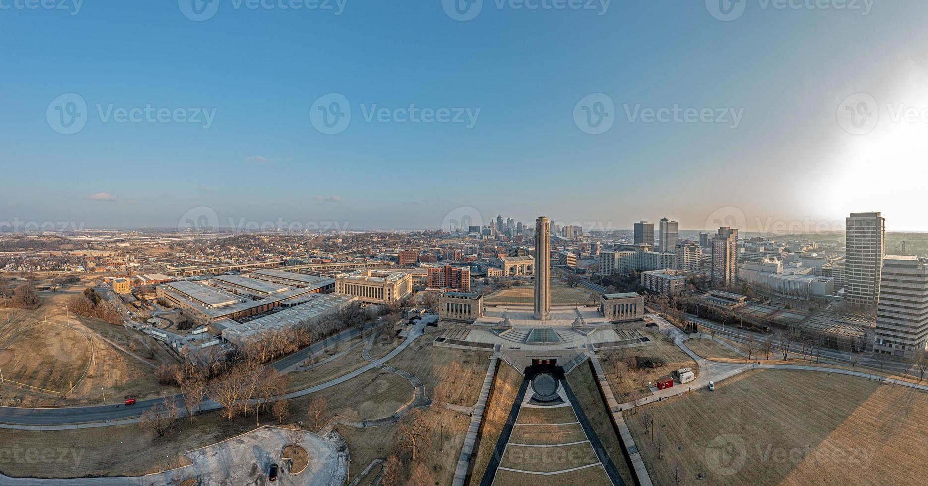 Drone panorama of World War II memorial with Kansas City skyline during sunrise photo