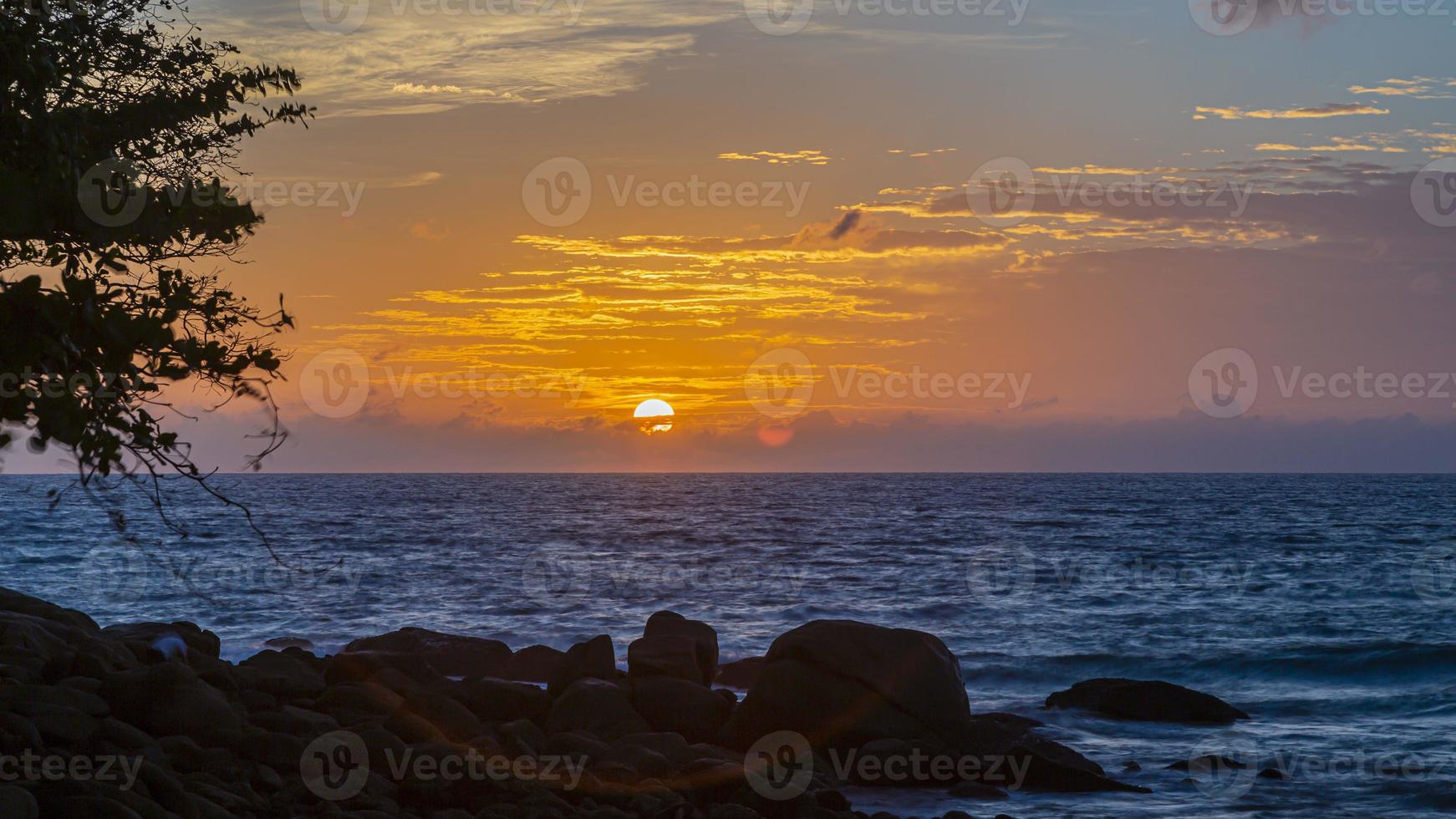 Picture of colorful sunset at Kamala beach in Thailand in summer photo