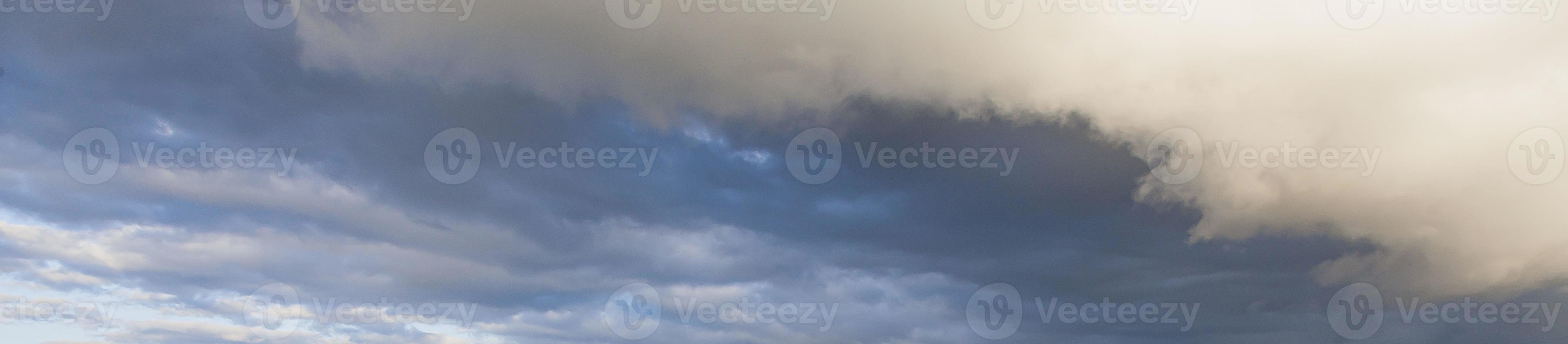 Image of a partly cloudy and partly clear sky during the day photo