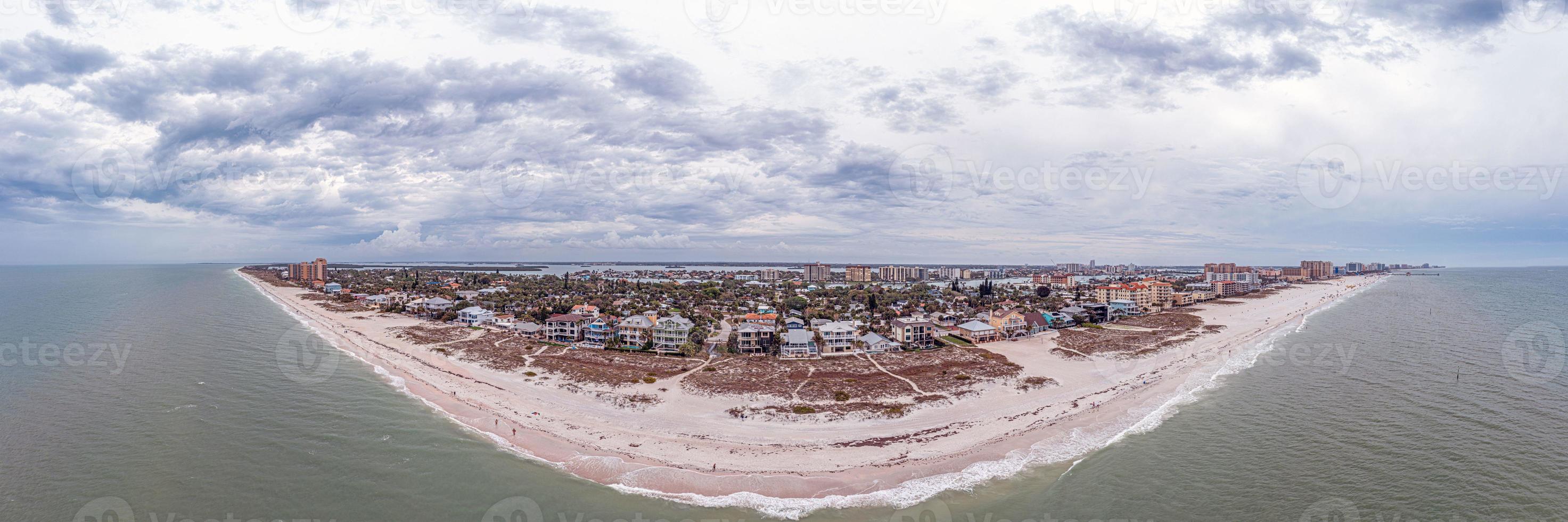 Drone panorama over Clearwater beach in Florida at daytime with cloudy skies photo