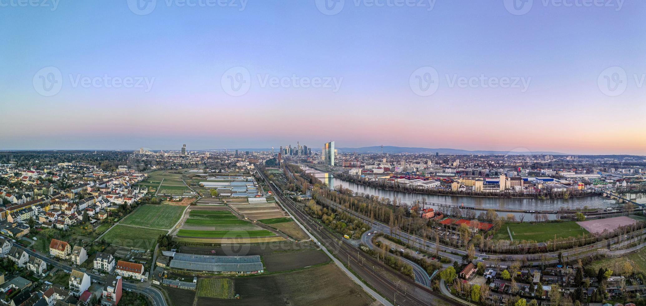 Aerial picture of Frankfurt skyline and European Central Bank building during sunrise in morning twilight photo