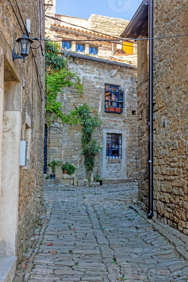 Typical street scene of the medieval town of Groznjan on the Istrian peninsula without people photo