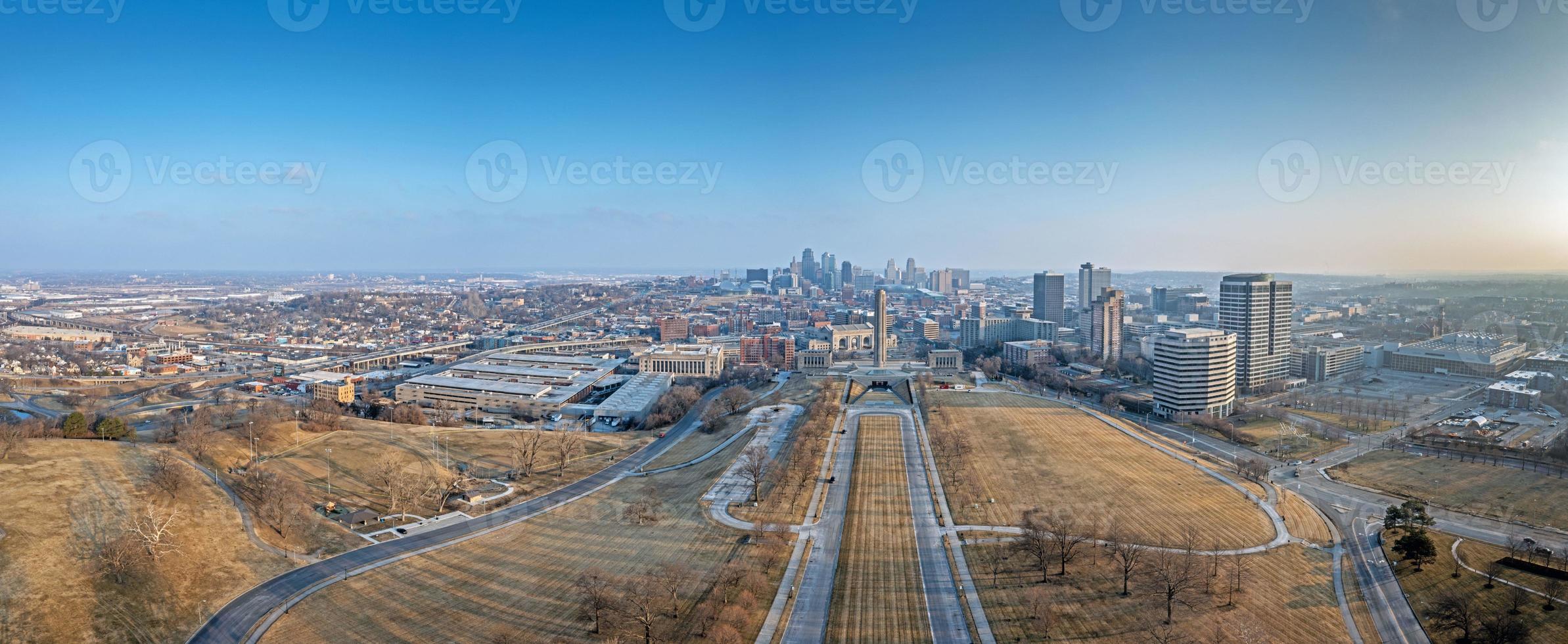 Drone panorama of World War II memorial with Kansas City skyline during sunrise photo