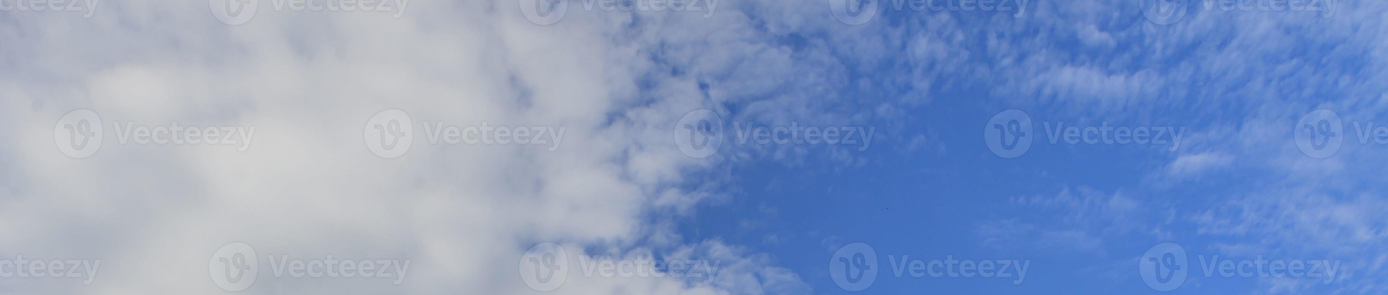 Image of a partly cloudy and partly clear sky during the day photo