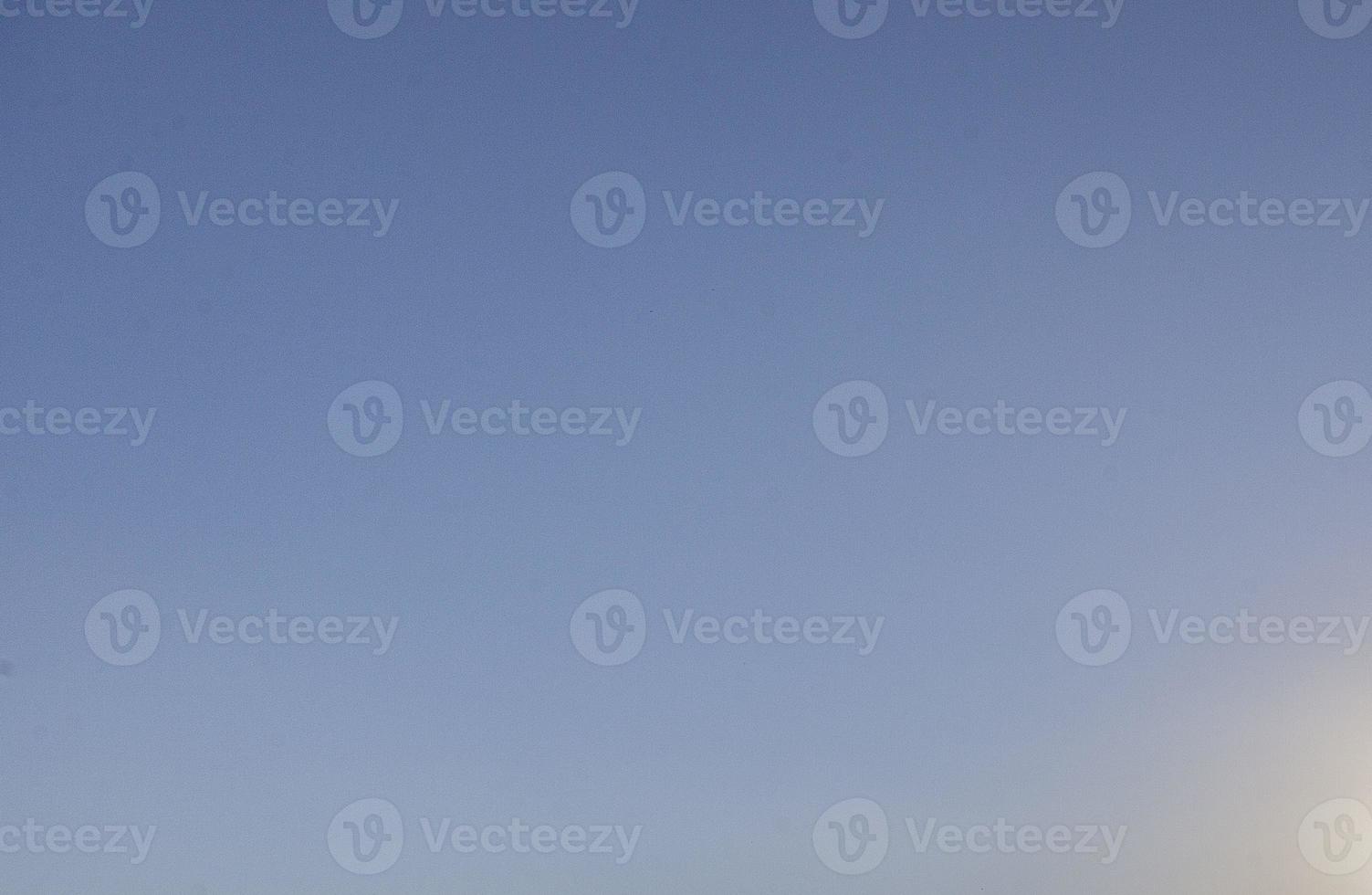 Image of a clear and cloudless sky can be used as background photo